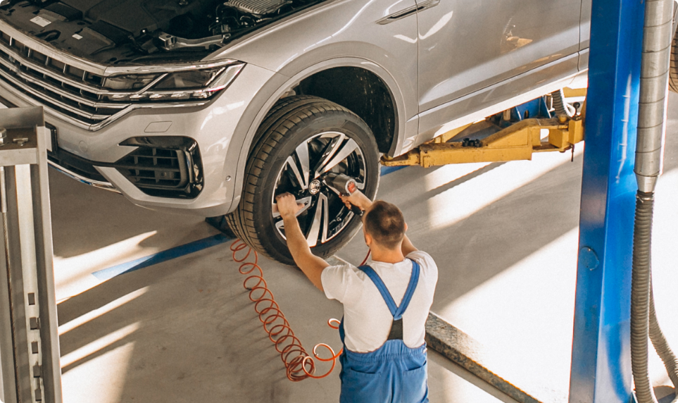 auto-mechanic-checking-car